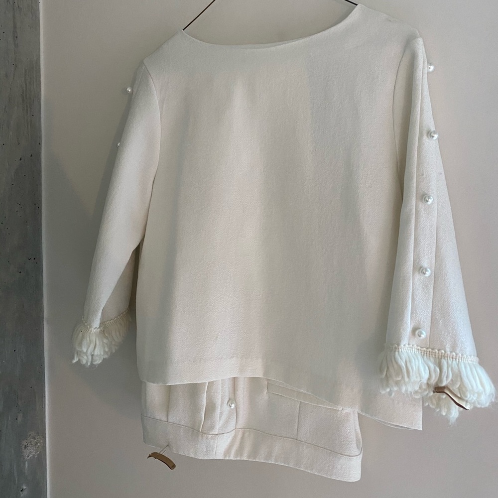 cream pearl suit
